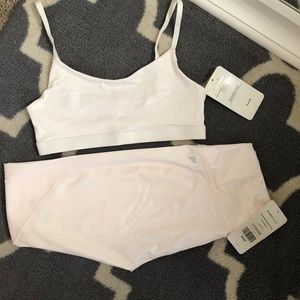 Brand new Fabletics iridescent set in Small.